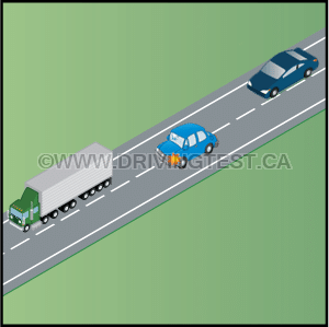 How should you pass a truck or other long vehicle? - How should you pass a truck or other long vehicle?