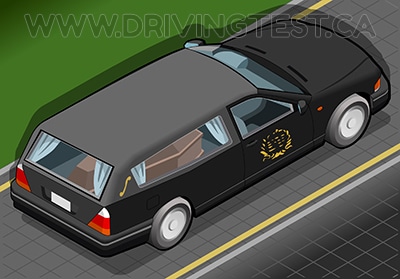 Test 1 - What are you prohibited from doing when you see a funeral procession on the road?