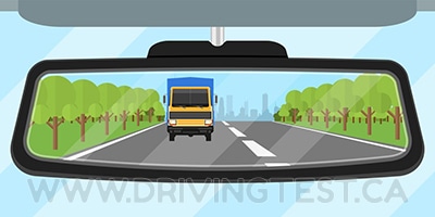 What do you need to be able to see in your rearview mirror before cutting back in after passing a truck? - What do you need to be able to see in your rearview mirror before cutting back in after passing a truck?